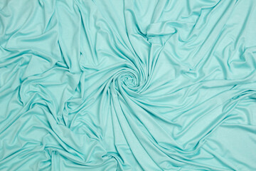Fabric cotton fold, top view. Blue textile	
