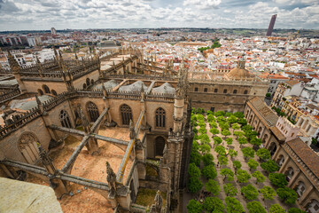 Obraz premium Panoramic view of the city of Seville from the buttresses of the gothic roof of the cathedral, Spain.