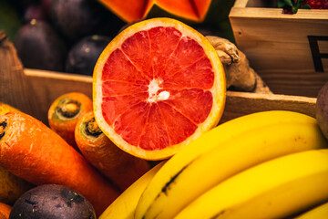 tropical fruits and useful. grapefruit and bananas in combination with vegetables. fruit mix