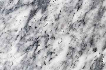 Facade walls are covered with marble tiles