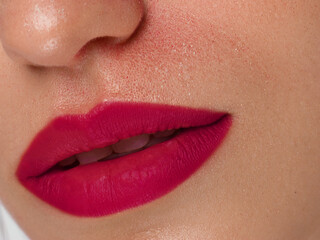 Obraz premium Sexual full lips. Natural gloss of lips and woman's skin. The mouth is closed. Increase in lips, cosmetology. Natural lips. Great summer mood with open eyes. fashion jewelry. Pink lip gloss