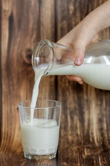 pouring milk into a glass
