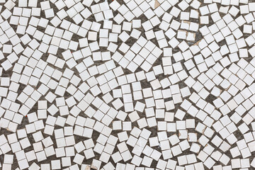 abstract background white glossy tiles lining the walls of the building