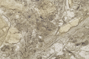 Texture of light brown marble with pattern, macro background. Olive stone backdrop from mineral tile.