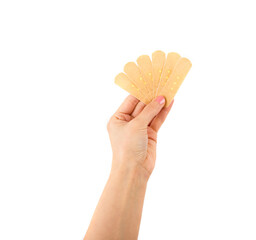 Hand putting adhesive bandage or plaster. band-aid on a cut.