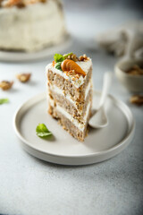 Traditional carrot cake with cream cheese and walnuts