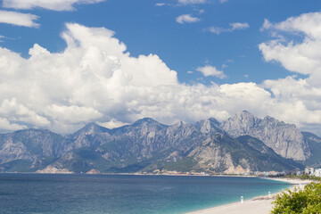 wide view of large big mountain landscape. blue sky. blue sea against mountain. panorama mountain view. 