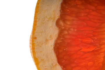 A slice of grapefruit close-up on a white background
