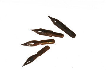 old and rusty nibs over white