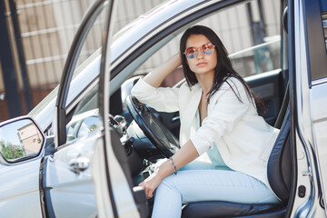 Gorgeous lady in fansy car