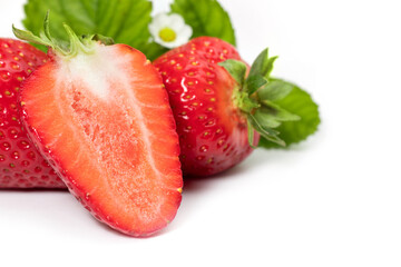 Strawberries with leaves. Isolated on a white background.