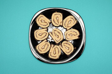 Roll cake on the plate