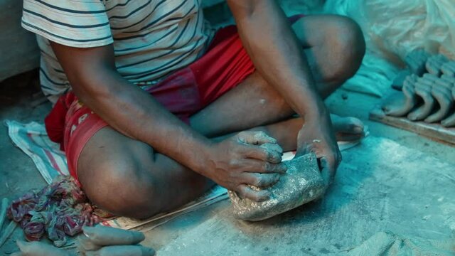Artisan making idol