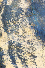 Creative beautiful blue background, blue spray paint on concrete with cracks and scratches. Landscape style. Grungy concrete surface. Great background or texture.