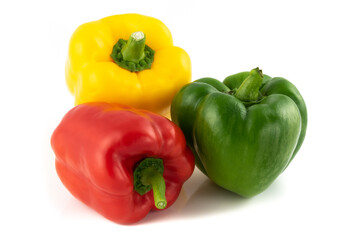 Trio of Bell Peppers close up isolated on a white background.
