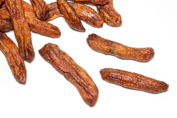 dry bananas pile against white background