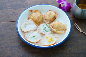 Thai dessert (Khanom Krok) has a fragrant, soft and sweet flavor.