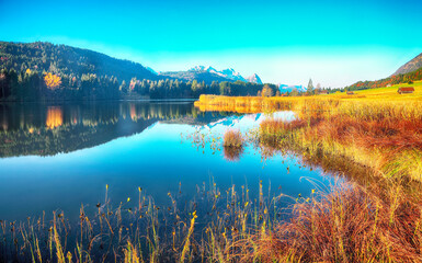 Astonishing view of Wagenbruchsee (Geroldsee) lake with Zugspitze mountain range on background.
