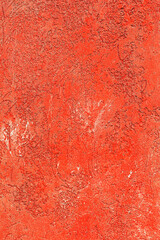 Creative beautiful bright red background, cracks and scratches on the concrete. Grungy concrete surface. Great background or texture for your project.