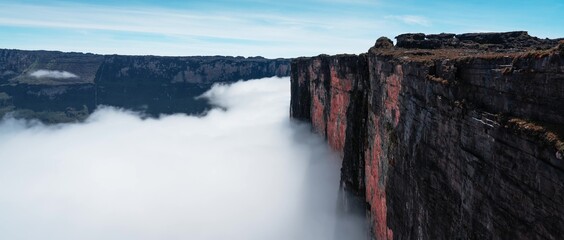 Cliff above the clouds. South America
