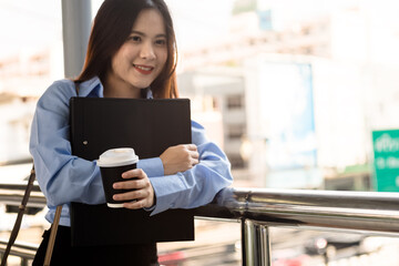 Fototapeta premium Beautiful Woman hold cup of coffee in the morning.