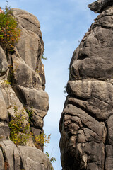 Sandstone rock formation Externsteine in Teutoburg Forest, Germany .