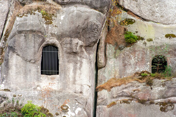 Sandstone rock formation Externsteine in Teutoburg Forest, Germany .