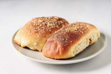 Close-up of homemade buns in a gray plate