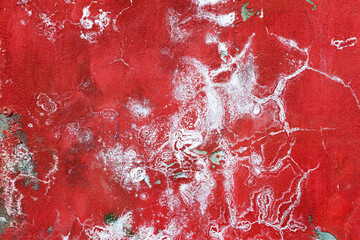 Creative background beautiful concrete carelessly painted red and white paint, cracks and...