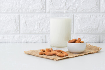 Milk Almonds in a glass on a white background