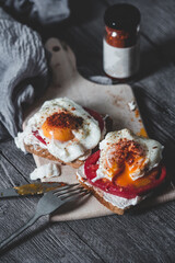 Poached egg on toast. Selective focus.