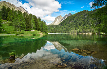 Landscape panorama of Lai da Palpuogna / Palpuognasee, mountain lake, Albula Pass in the municipality of Bergün, in the Grisons, Switzerland                     