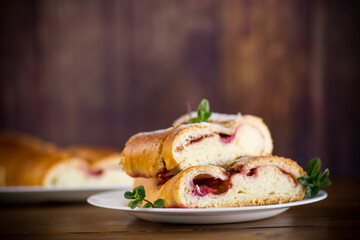 sweet baked yeast dough pie with berries
