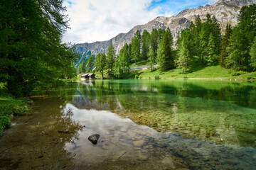 Landscape panorama of Lai da Palpuogna / Palpuognasee, mountain lake, Albula Pass in the municipality of Bergün, in the Grisons, Switzerland                     