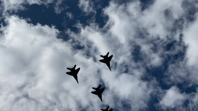 May 7, 2020 - Belarus, Minsk - military aircraft fly in the sky, rehearsal of the May 9 Victory Day parade during the coronavirus pandemic. video with sound
