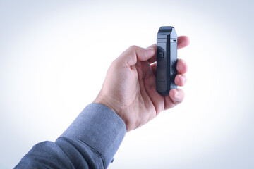 Hand holding an electronic cigarette - Vaper - e-Liquid - Vape , E-cig , vaping , ecig