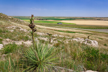 A landscape in Western Nebraska, seen over a hill