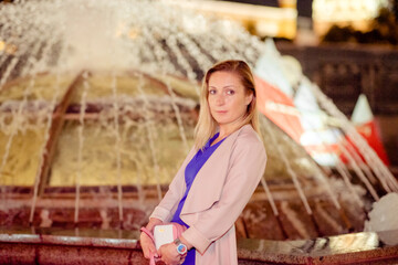 Fototapeta premium Cinematic night portrait of girl and neon lights.