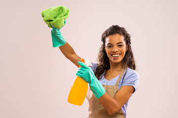 Portrait of happy and successful african-american housewife who is ready for housework.