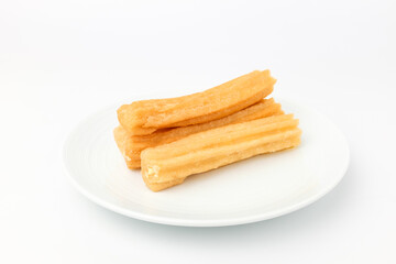 Elongated Churos on white background