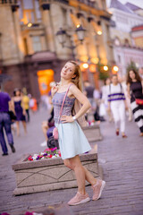 Moscow, Russia-2018 22 June. Beautiful young girl smiling on sunny street. Lifestyle Concept