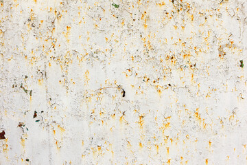 Abstract rusty metal surface with cracked white paint. Textured background for your concept or project. Great background or texture.