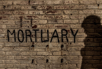 the inscription on the wall mortuary 