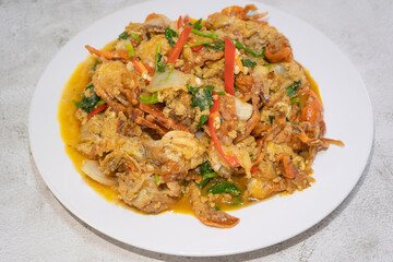 Stir Fried soft shell crab yellow curry powder ingredients it is the favorite delicious Thai, Chinese seafood of Thailand