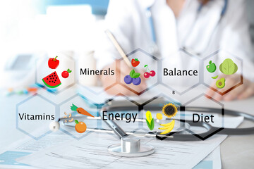 Nutritionist's recommendations. Doctor working at table in office, closeup