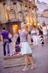 Beautiful young girl smiling on sunny street. Lifestyle Concept