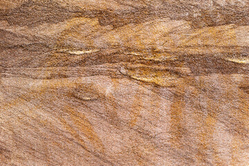 Abstract background concrete painted yellow paint, weathered with cracks and scratches. Landscape style. Grungy Concrete Surface. Great background or texture.