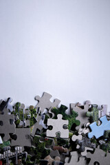 multicoloured puzzles on a white background. isolated. Top view, copy space. . High quality photo