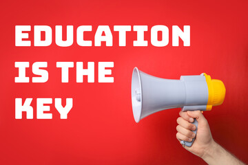 Phrase EDUCATION IS THE KEY and man with megaphone on red background, closeup. Adult learning