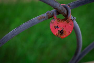 red old padlock in the shape of a heart